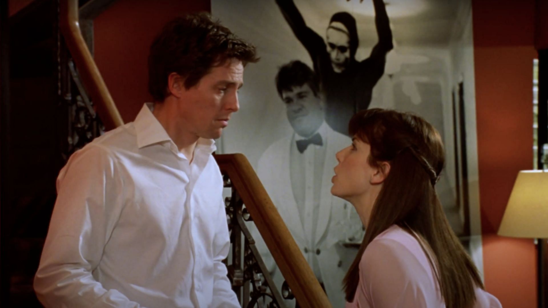 Grant and Bullock in Two Weeks Notice (Image via YouTube/Warner Bros. Rewind)